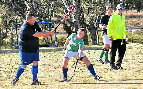Alan Balfour hits out in club hockey, Ryan Collins is in defence. Alan Balfour hits out in club hockey, Ryan Collins is in defence.
